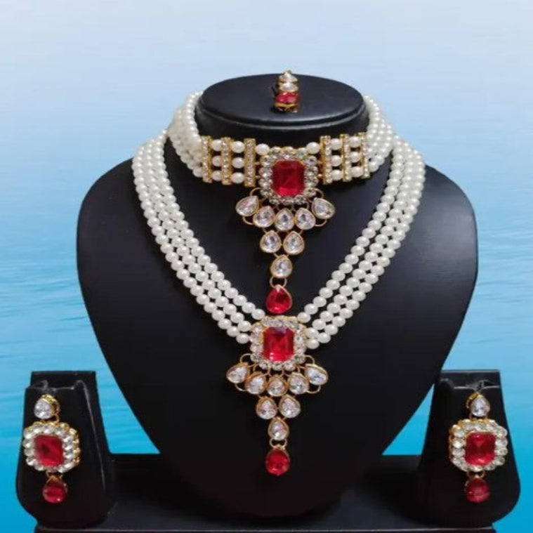 The Stunning Rock combo necklace set with earrings and maang tika