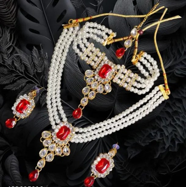 The Stunning Rock combo necklace set with earrings and maang tika