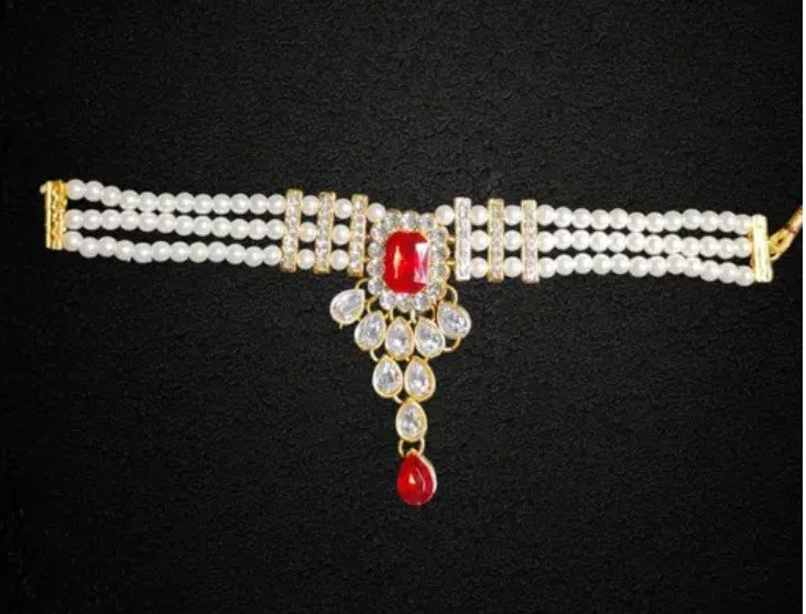 The Stunning Rock combo necklace set with earrings and maang tika