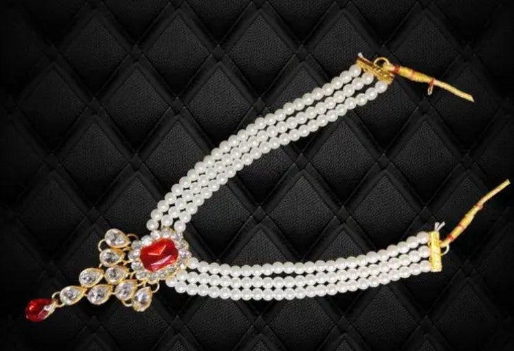 The Stunning Rock combo necklace set with earrings and maang tika
